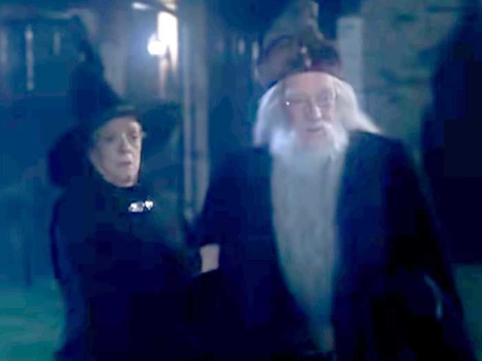 Professor McGonagall wears a standard witch outfit for her first appearance, complete with a pointy black hat.