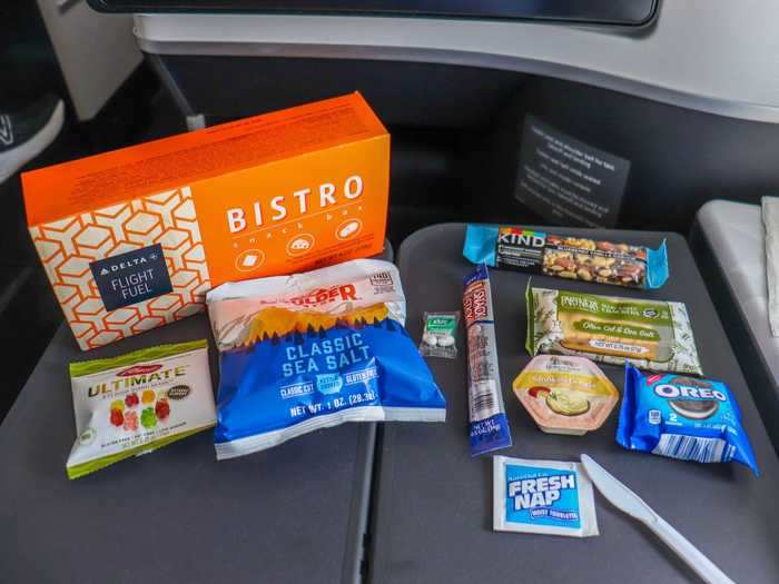 First up was the bistro snack box. It was packed with goodies like gummy bears, potato chips, a meat stick, Tic Tacs, a cheese spread, Oreo cookies, a Kind bar, and crackers.