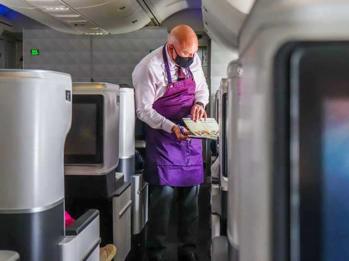 The in-flight service soon started after we got airborne. Flight attendants took orders individually for the drink and snack service.