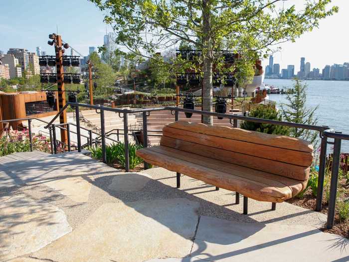 Seating benches and bunches of greenery and flowers also line every walkway.