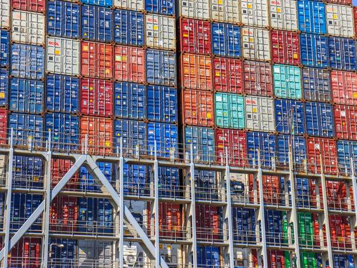 Containers are stacked up on top of each other 200 feet high, with even more below deck.