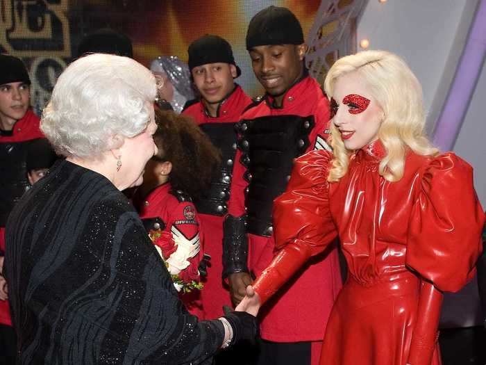 At the same event, Lady Gaga met the Queen while wearing an unconventional costume.