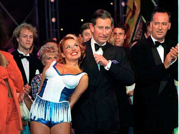 In 1997, Geri Halliwell of the Spice Girls posed next to Prince Charles while wearing platform sneakers.