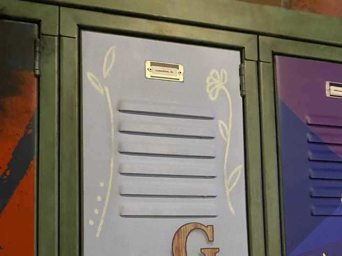 One locker in the top center is a special tribute to a former Disney employee.