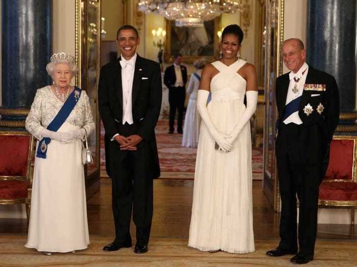 Queen Elizabeth wore a long-sleeved white gown for a state dinner in the Obamas