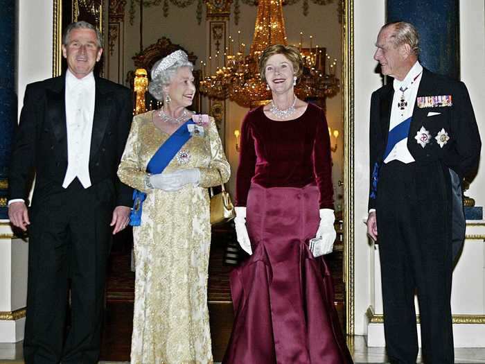 When George W. Bush and his wife, Laura, visited Buckingham Palace in 2003, Queen Elizabeth hosted a state dinner in a gold evening gown.