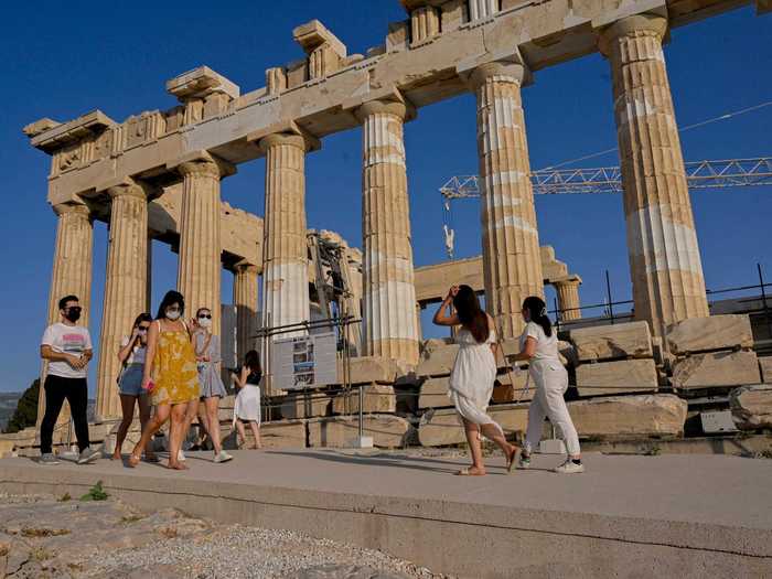 Tourists have returned to historic sites, too, like the Parthenon Temple on Acropolis Hill in Athens, Greece.