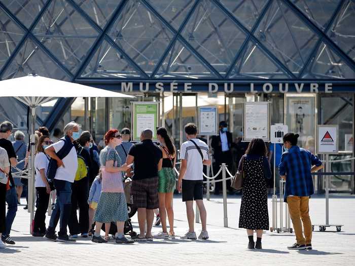 Visitors lined up to visit the Louvre museum in Paris on Wednesday.