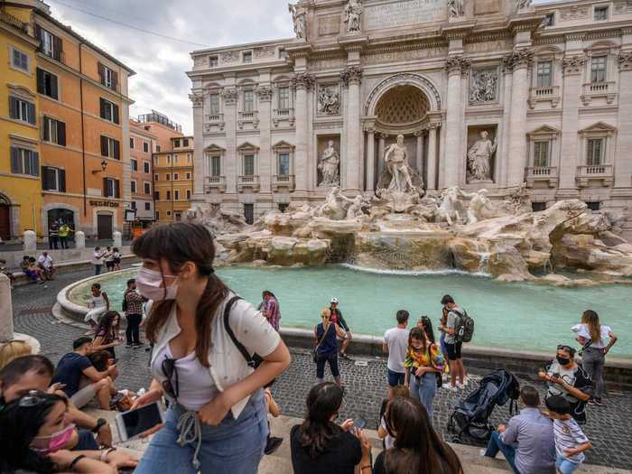 In Rome, tourists gathered for pictures in front of the Trevi Fountain.