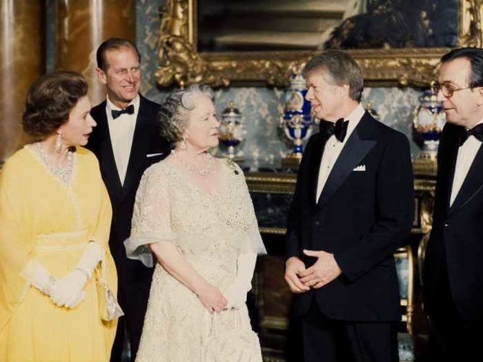 President Jimmy Carter broke royal protocol by kissing the Queen Mother on the lips during his visit in 1977.