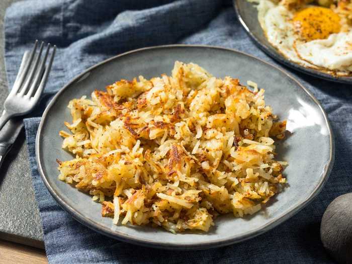 Elevate your morning hash browns with some chives and Parmesan.