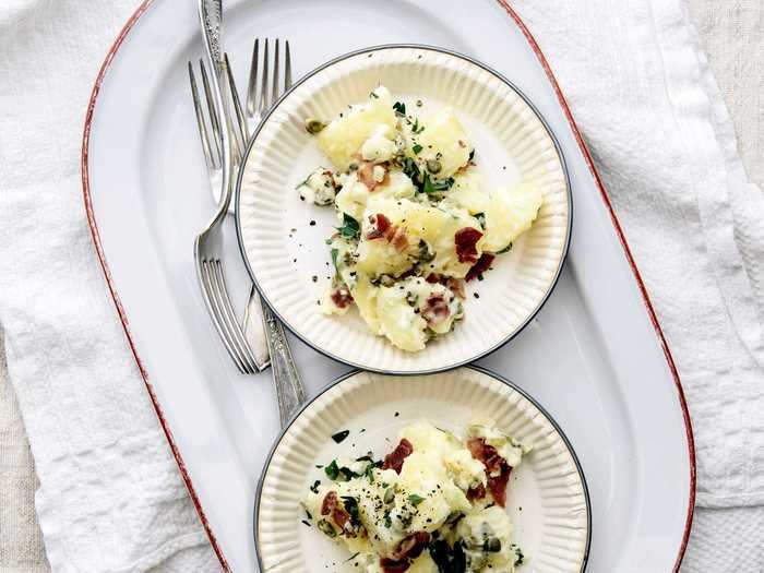 Take your traditional potato salad up a notch by first cooking your spuds in hot chicken broth.