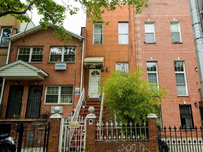 Just a few blocks away, 355A Monroe St. is a two-family residence that