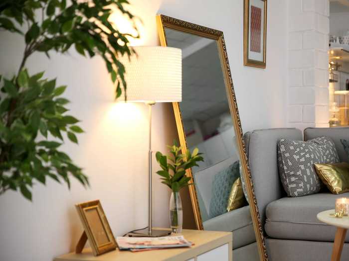 A lack of natural light can be remedied by incorporating decorative mirrors into your space.