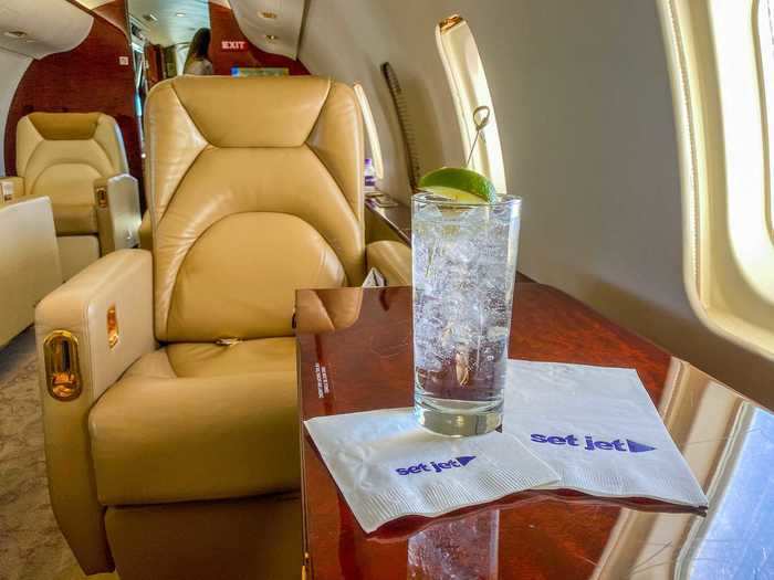 I ordered a club soda with lime and was pleasantly surprised to see actual glassware on a plane. Most airlines had done away with glasses during the pandemic but this was a private jet, after all.