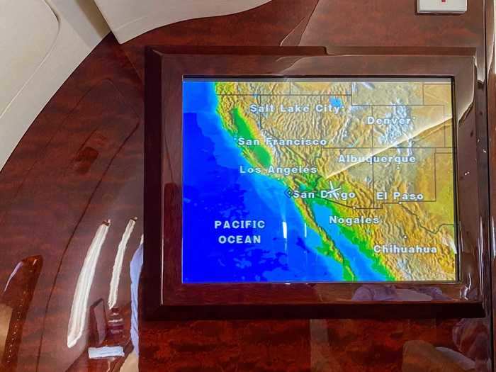 Maps in the cabin kept passengers informed on the flight