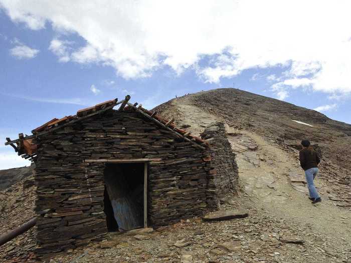 When visitors arrive, they start at the base of the mountain, where the abandoned ski resort still stands.