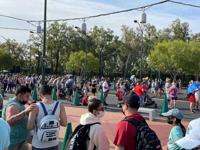 Many of those visiting Disneyland on Tuesday went without masks, as the theme park is no longer requiring face coverings throughout its theme park.