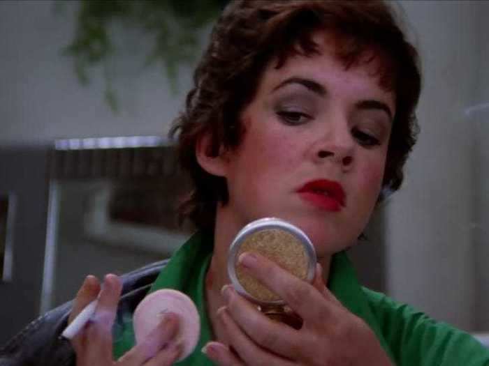 Rizzo has unblended powder on her face in one scene, and another Pink Lady does her makeup in the dark at one point.