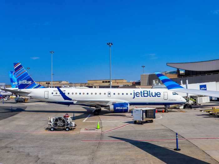 Our aircraft was conveniently parked next to the Embraer E190, the jet that the A220 is replacing. JetBlue never bothered to update those aircraft and it shows when flying them.