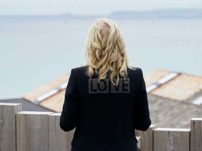 Most recently, Biden wore a black jacket with the word "love" spelled out on the back.