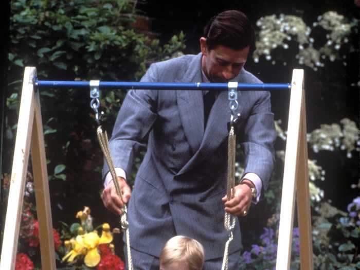 When Charles became a father, he pushed Prince William on swings the way his father had for him.