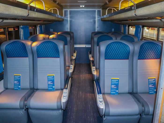 The tired blue cloth seats of Amtrak