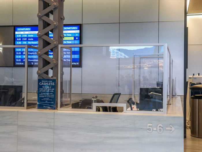 Ticket counters feature plexiglass partitions and hand sanitizer stations can be found throughout the station.