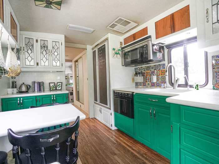 The kitchen has enough space for all seven family members to sit down for dinner together each night.