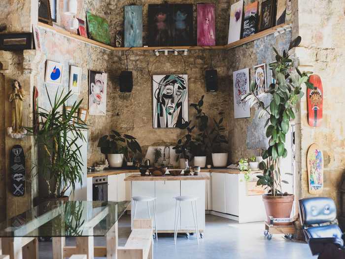 Artwork and skateboard decks help infuse the kitchen with Careaga