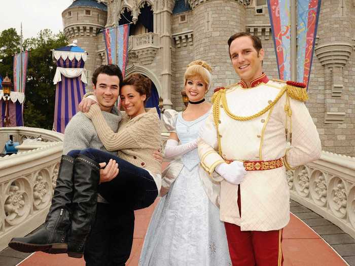 Kevin Jonas and Danielle Jonas celebrated their first wedding anniversary in December 2010 with Cinderella and Prince Charming at Disney World.