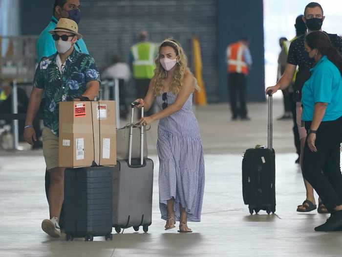 The passengers are either Royal Caribbean employees who volunteered to take part in the trial voyages, or their adult plus-one