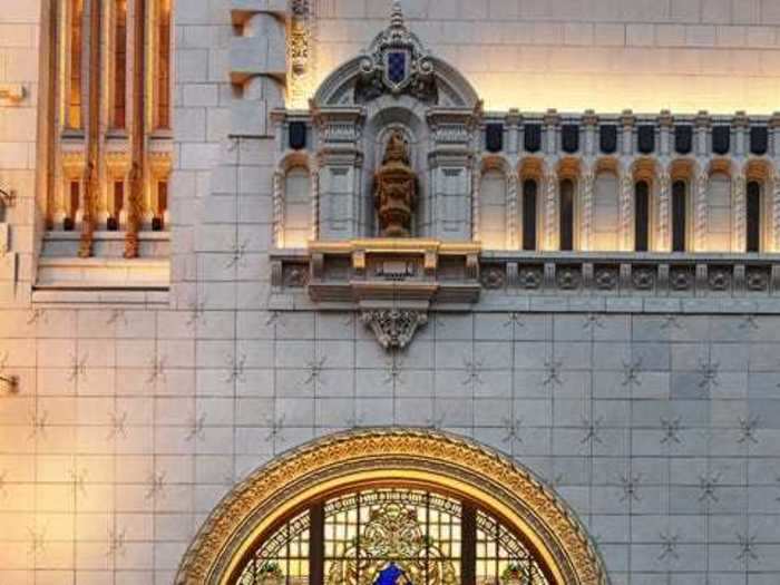 Customers enter through Broadway-style doors beneath stained glass ...