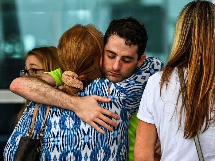 Survivors and family members from the Champlain Towers South at the Surfside Community Center.