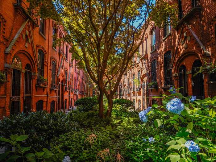 As soon as I walked through the fence, I felt transported to a different time and place. These gothic-style row houses and gardens were built in the 1870s, according to The Wall Street Journal.