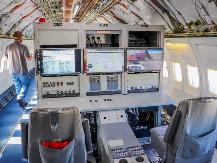 Massive computer testing stations replaced the passenger seats in order to collect data and monitor the onboard systems being tested.