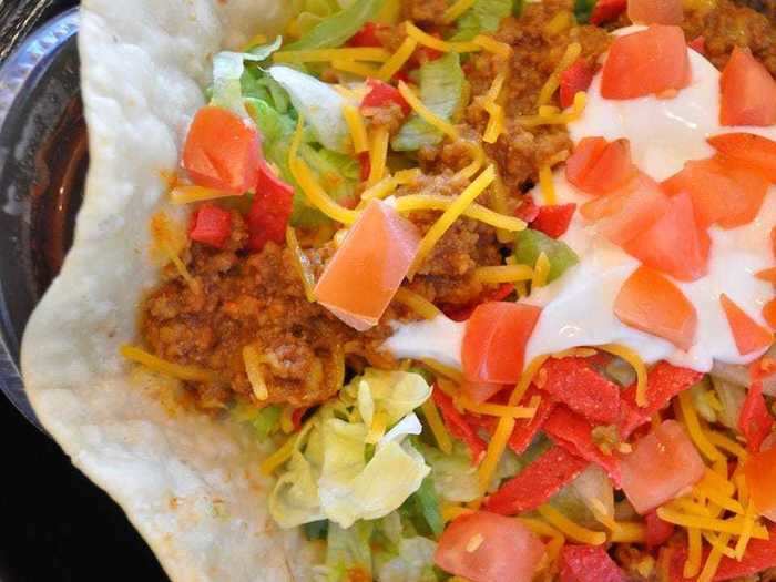 In 1984, Taco Bell introduced the Taco Salad and Taco BellGrande.