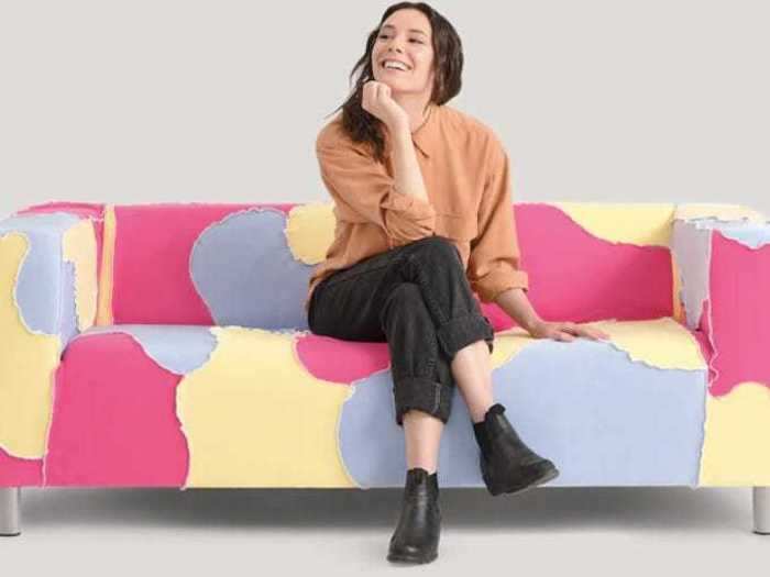 The loveseat collection also includes a piece with pink, yellow, and blue splotches, modeled after the colors of the pansexual flag.