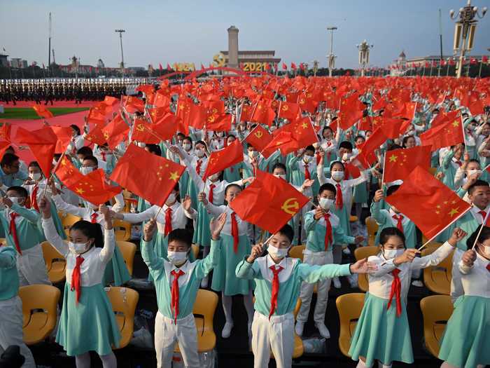 Students were part of a massive crowd that gathered in Tiananmen Square in Beijing to celebrate the event.