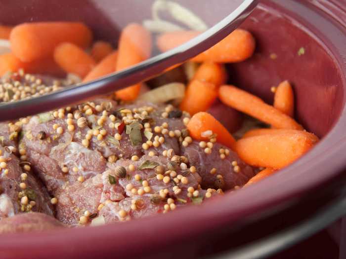 Lifting the lid of the slow cooker too often will lower the temperature.