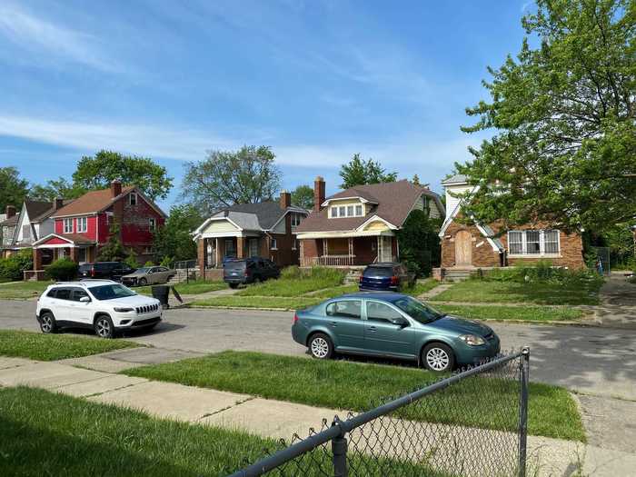 Back outside, the next-door neighbor said this house has sat abandoned for over 10 years.