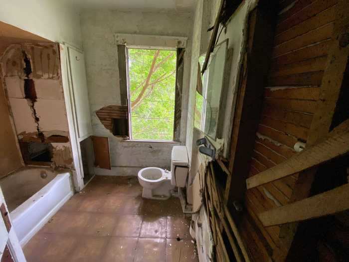 The bathroom was torn to pieces. At this point, I realized just how much work it would take to bring one of these homes back to its former glory.