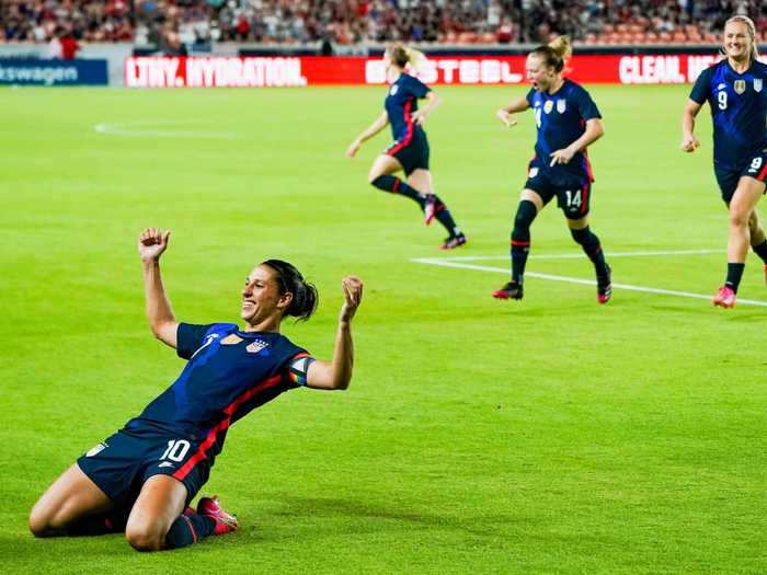 6/13: US soccer superstar Carli Lloyd celebrates scoring a goal for the USWNT.