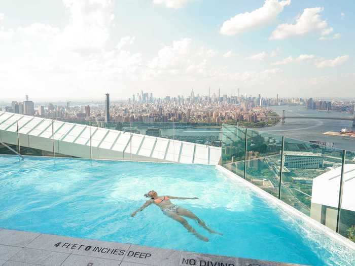 Swimming by myself, the pool felt spacious. Insider got private access to the rooftop, but normally at 5 p.m., there would be other guests around.