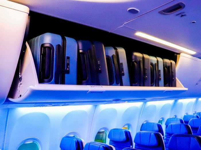 Larger overhead bins are another staple of the new interior with United claiming there will be enough room for every passenger to bring at least one bag.