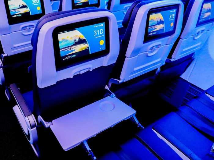 All seats will also have in-seat power through 110v AC power outlets under the seat and USB charging ports on the screens.