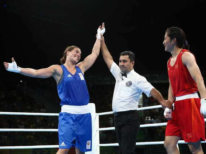 Nouchka Fontijn of the Netherlands with some friendly taunting after defeating Qian Li of China.