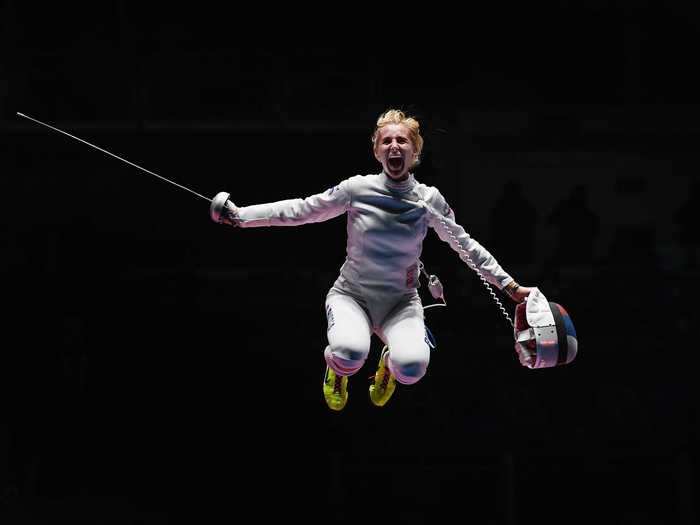 Violetta Kolobova of Russia celebrates winning bronze.