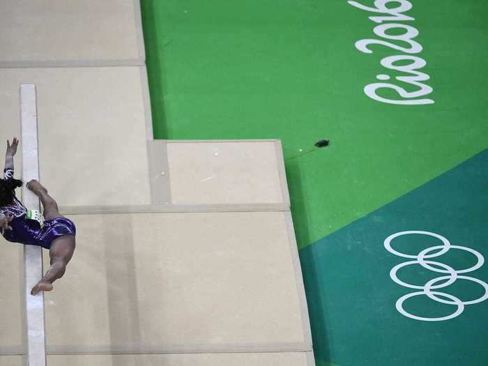 Brazilian gymnast Rebeca Andrade stretches out on the balance beam.