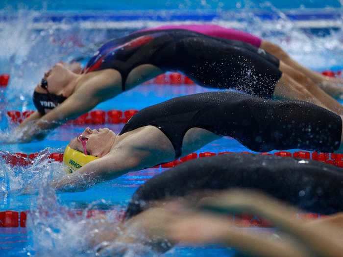 Backstrokers in unison.